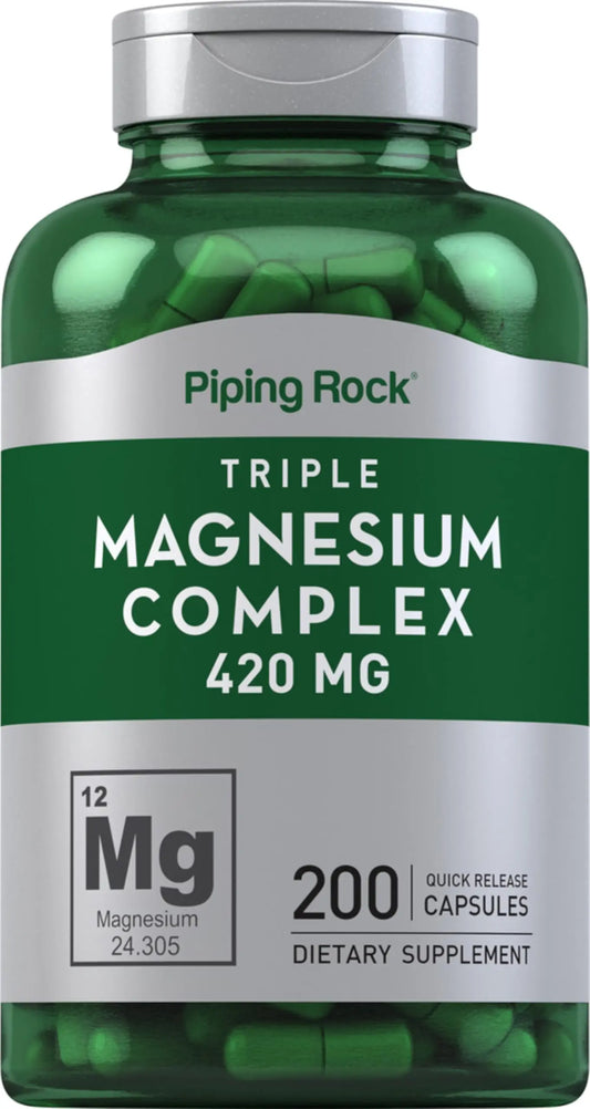 Green supplement bottle labeled 'Triple Magnesium Complex 420 MG' by Piping Rock with a silver cap.